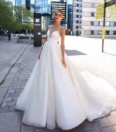 Graceful Lace Beaded Wedding Dresses Appliqued A Line Sheer Bateau Neck Bridal Gowns Hollow Back Sweep Train Tulle vestido de novia