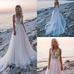 Beautiful A Line Beach Wedding Dresses Deep V Neck Sleeveless Lace Up Beads Tulle Wedding Dress Sweep Train Boho Bridal Gowns