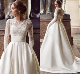 Robes De Mariée Manches Longues Modestes Avec Poches Scoop Satin Appliqued Une Ligne 2019 Robes De Mariée En Turquie Robes De Train De Balayage