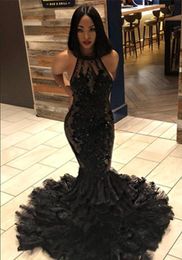 Black Halter Lace Mermaid Long Prom Dresses 2019 Illusion Tulle Applique Beaded Feather Layers Sweep Train Formal Party Evening Gowns