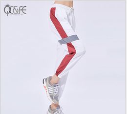 New style women's loose breathable leisure reflective strip sports pants show thin yoga fitness running closure Leggings