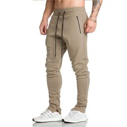 New Design Men Sportswear Pants Casual Elastic Mens Fitness Workout Pants skinny Sweatpants Trousers Jogger Pants For Males