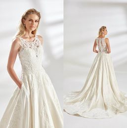 Modern Ball Gown Eddy Wedding Dresses Spaghetti Sleeveless Tulle Lace Applique Button Wedding Gowns Sweep Train robe de mariée