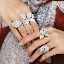 Luxuosa da infinidade de jóias reais Cubic Wedding ajustável 925 Sterling Silver Pave White Clear 5A Zirconia Eternity Abrir Flor Anel para as Mulheres