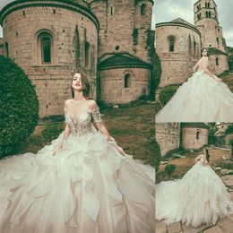 Modest Bohemian Corona Borealis Ball Gown Wedding Dresses Short Sleeve Tulle Lace Pearls Crystal Wedding Gowns Sweep Train robe de mariée