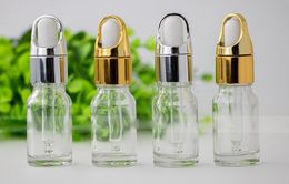 New Arrival Wholesale 10ml Glass Dropper Bottle Clear Essential Oil Bottles with Gold and Silver Cap