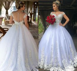 Sexy Luxury Beads Ball Gown Wedding Dresses A Line Sheer Long Sleeve Lace Appliques Sequins Cap Sleeve Bridal Gowns With Covered Buttons