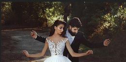 2020 Sheer Long Sleeves Lace Mermaid Beach Wedding Dresses Jewel Neck Appliques Illusion Sweep Train Dubai Bridal Gowns With Butto218g