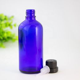 Empty 100ml Cobalt Blue Glass Essential Oil Glass Bottles Glass Liquid Bottles With Black White Tamper Evident Cap