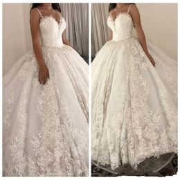 2019 New Sexy Arabic Ball Gown Wedding Dresses Deep V Neck Spaghetti Lace Appliques Sleeveless Open Back Plus Size Formal Bridal Gowns