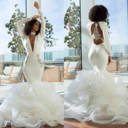 Sexy Open Back Mermaid Wedding Dresses Turkey 2022 Tiered Tiers Lace Ruffles Deep V Neck Long Sleeves Bridal Gowns African Puffy Fishtail Bride Dress Plus Size