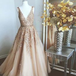 Elegant Champagne Lace and Tulle Prom Dresses Deep V Sheer Neck Applique Ruffle Formal Evening Party Gowns Zipper Back Floor Length Real