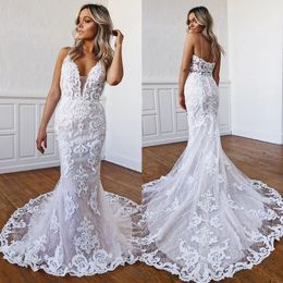 Amazing Mermaid Lace Wedding Dresses Sheer Plunging Neck Appliqued Covered Buttons Back Bridal Gowns Sweep Train Trumpet robe de mariée