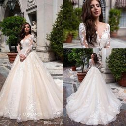 2019 Sheer Long Sleeves Lace A Line Wedding Dresses Tulle Applique Court Train Wedding Bridal Gowns With Buttons BC1987