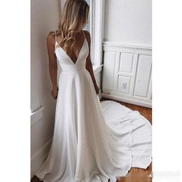 2020 Beach Wedding Dresses Sexy Spaghetti Straps Illusion Backless Luxury Beaded Crystals Satin Chiffon Chapel Train Wedding Gown