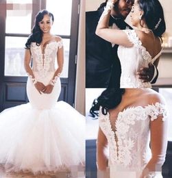 2020 Newest Mermaid Dresses Off the Shoulder Illusion Plunging V Neck Long Sleeves Lace Applique Floor Length African Wedding Gown
