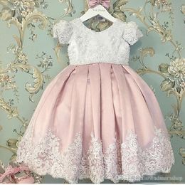Cute White and Pink Wedding Flower Girl Dress O Neck Appliqued Lace Bead Pearls Luxurious Cap Sleeve Pleated Bow Girl Pageant Dresses