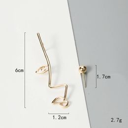 Wholesale-Unique personality Hollow Face Metal Drop Earrings Twisted Abstract Earrings for Woman