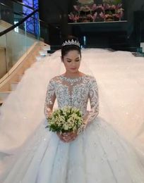 2022 Modern Arabic Muslim Long Sleeves Wedding Dresses Puffy A Line Sheer Jewel Neck Appliques Sequins Beads Long Formal Bridal Go262t