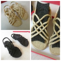 2020 ins summer Hemp rope sandal leisure vacation rattan grass flax cross flat flat hand woven jute woven shoes female