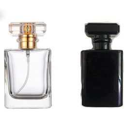 Prix ​​de gros transparent parfum en verre noir Vaporisateur 50ml bouteilles vides Atomiseur pour cosmétiques Voyage conteneurs Livraison gratuite