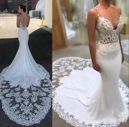 New Arabic Cheap Mermaid Wedding Dresses Spaghetti Straps Lace Appliques Illusion Satin Sleeveless Chapel Train Backless Formal Bridal Gowns