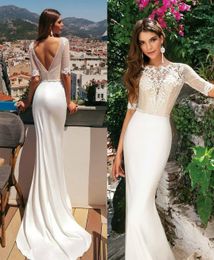 Fabulous Mermaid Lace Backless Wedding Dresses Sheer Bateau Neck Beaded Bridal Gowns With Half Sleeves Trumpet Plus Size robe de mariée