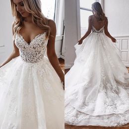 African Lace Wedding Dresses Spaghetti Straps Deep V-Neck Tiered Backless Court Train Appliques Vestidoe De Noiva Stylish Castle Bridal Gown