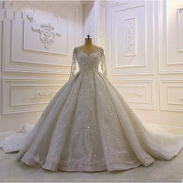 Quality Long Sleeve Pearls Beaded Lace Big Ball Gown Wedding Dresses in Dubai Luxury Long Tail