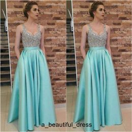 Amazing Mint Green Satin Prom Dresses Aline With Pocket Top Rhinestone Beaded Elegant Formal Evening Gowns V Neck robes de soirée ED1256