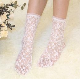 Women's Breathable Hem Lace Flower Fishnet Socks.Vintage Ladies Girls Lolita Fishnets Hollow out Mesh Nets Floral Lace Socks Sox 2 Colours