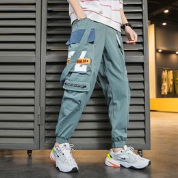 2020 mens pants New Casual Jogger Pants Men Streetwear Ribbon Side-pocket Mens Harem Pants Trousers Men ABZ651