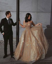 Saudi Arabic Gold A-line Prom Dresses spaghetti 2019 Sexy Backless Luxury Long Evening Gowns Abiti Da Cerimonia Da Sera Fashion Prom Gowns