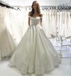 Simple Custom Made Wedding Dresses Off Shoulder Short Sleeves With Pockets Arabic Sweep Train Satin A Line Wedding Bridal Gowns Q54