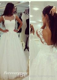 2019 Graceful Ball Gown Wedding Dress Vintage Pricness White Appliqued Lace Backless Long Arabic Dubai Bridal Gown Custom Made Plus Size