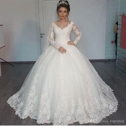 Sexy White Gorgeous Sheer Ball Gown Wedding Dresses Puffy Lace Beaded Applique White Long Sleeve A Line Wedding Gowns robe de mariage