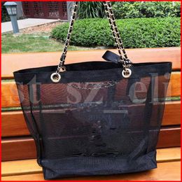 Famous Makeup Bag black net yarn transparent shopping Cosmetic bag chain shoulder bags cosmetics organizer travel beach bag