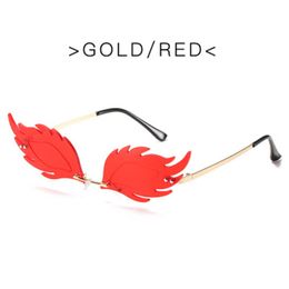 New small fish frameless sunglasses wholesale Women's European and American metal frame ocean piece Sunglasses Flame feather hedgehog glasse