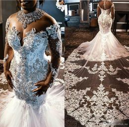 アフリカ人マーメイドのウェディングドレス高級クリスタルビーズヴェスディドデロングスリーブプラスサイズのウェディングドレスアップリケレースブライダルガウン