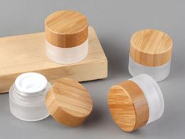 New environmental protection bamboo and wooden cover cosmetic packaging material eye cream glass bottle 20g transparent scrub cream bottle
