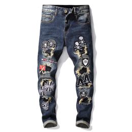 Mens Designer Ripped Hole Crânio Bordado Patchwork Jeans Corredores Moda Masculina Azul Denim Calças Impresso Angustiado Pedra Lavada Calças