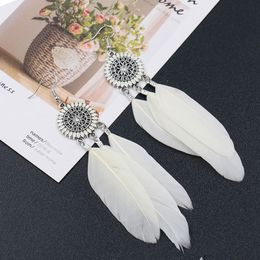 Wholesale- New 8colors Boho feather round earrings Korean holiday personality exaggerated Bohemia earrings Jewellery earring NE896