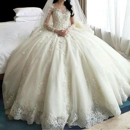 2020 New Luxury Arabic Ball Gown Wedding Dresses Jewel Neck Lace 3D Appliques Long Sleeves Cathedral Train Ruffles Plus Size Bridal Gowns