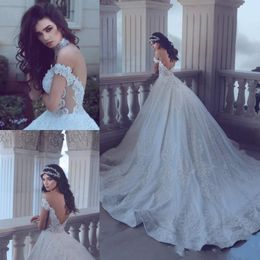 Arabic Ball Gown Wedding Dresses Lace Appliques Beaded Off Shoulder Open Back Chapel Train Plus Size Bridal Gowns