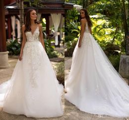 Sexy Open Back Garden Boho Wedding Dresses Sexy Low Backless Spaghetti Lace Appliques A Line Sweep Train Bridal Gowns Robe de soriee