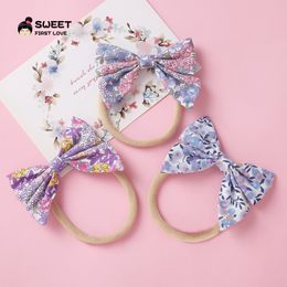 INS Girls Party Hair Accessory New European American Children Floral Bowknot Hairbands Baby Kids Elastic Cloth Print Bow Hair Band S311