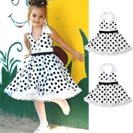 Vintage Kids Baby Girl Backless Summer Party Dress Senza maniche in pizzo con volant a pois Princess Dress Girl vita alta A-Line 1-6Y