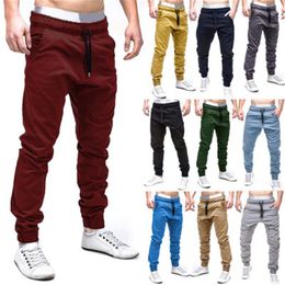 Man Elastic Pocket Sports Pants Fashion Trend Style Homme Casual Tether Trousers Clothing Designer Male New Apparel Solid Colour Harem Pants