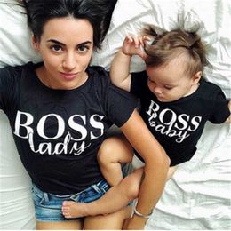 mom and newborn baby boy matching outfits