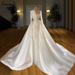 Entwirft formelle weiße Brautkleider mit abnehmbarem Rock, langen Ärmeln, Perlen verzierte Brautkleider, Brautkleider
